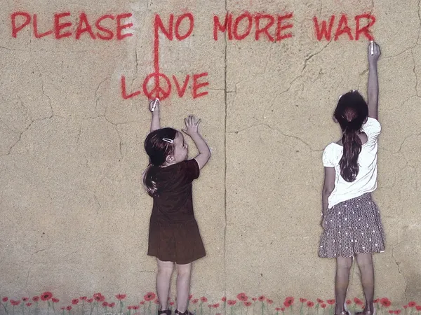 Graffiti Text: please no more war