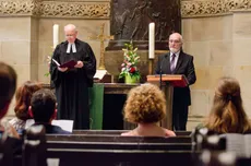 Oberkirchenrat Urs Keller und Synodalpräsident Axel Wermke