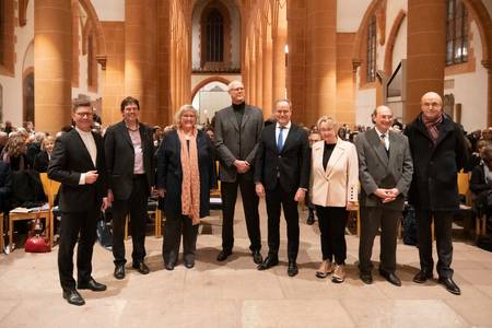 Personengruppe bei der Feier anlässlich des 400. Jahrestags der Wegführung der „Bibliotheca Palatina“ in der Heiliggeistkirche Heidelberg