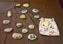 14 handbemalte Steine zur Weihnachtsgeschichte im Stoffsäckchen
