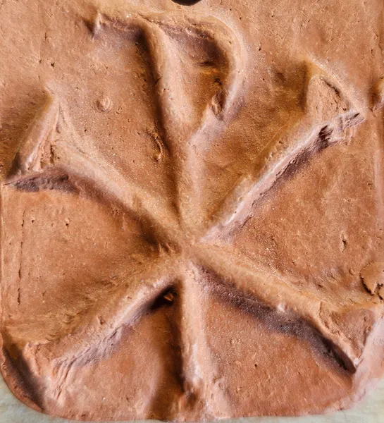 antikes Tonsiegel mit christlichen Symbolen